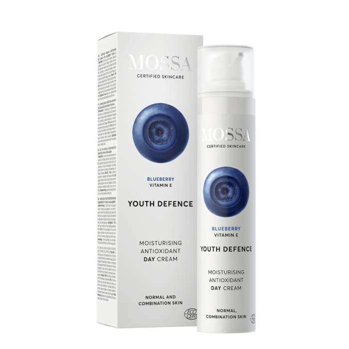 A white bottle and box of Mossa Youth Defence Moisturising Antioxidant Day Cream, for normal and combination skin. Both show a large blueberry image on the front.