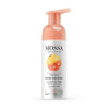 Mossa Glow Cocktail Cleansing Foam comes in a bottle with a peach pump. Its label highlights cloudberry and quince, and this vitamin-rich, vegan formula suits all skin types for a radiant complexion.
