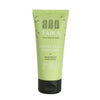 A light green tube of Taika Hand Cream with a black cap displays Finnish and English text plus small icons that highlight its natural and vegan features.