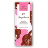 A chocolate bar with a pink and brown abstract wrapper labeled Foodin Organic Raw Chocolate Gingerbread 51%, made with organic spices and coconut sugar, handmade in Finland, featuring a small Finnish flag.