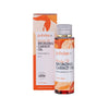 A 100 ml bottle of Puhdas+ Beauty Bronzing Carrot Oil stands beside its matching orange and white box with leaf designs and bilingual English-Finnish product details.