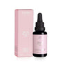 A pink box labeled FLOW Cosmetics Arctic Beauty Oil stands next to a small dark glass dropper bottle with a matching pink label. This 30ml anti-aging serum, rich in arctic berry seed oils, is ideal for sensitive skin.