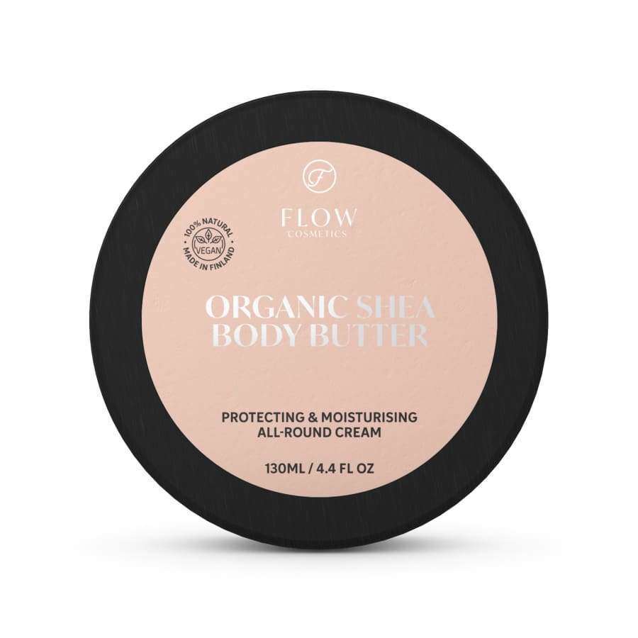 A 130ml round container of Flow Cosmetics Organic Shea Body Butter with a black lid and beige label, featuring vegan certification—perfect for natural, vegan skincare.