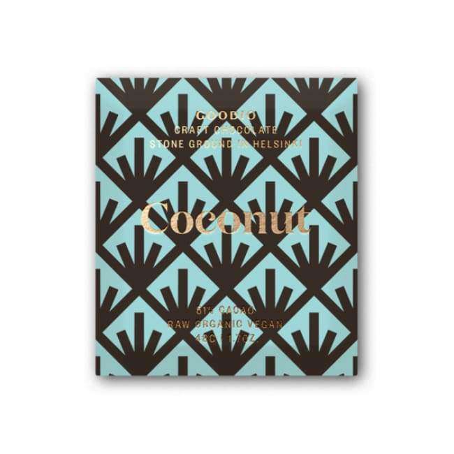 A square wrapper with a bold black and light blue geometric pattern says: "Goodio Organic Chocolate Coconut. 51% cacao, raw, dairy-free, organic vegan chocolate. Stone ground in Helsinki. Net wt. 48g (1.7oz).