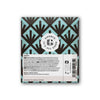 Back of a Goodio Organic Chocolate Coconut bar with blue and brown geometric design, featuring product details, barcode, recycling and food safety symbols; highlights its dairy-free, raw chocolate qualities from Goodio.