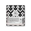 A chocolate bar with black and white geometric packaging features a round center label reading Goodio Organic Chocolate Sea Salt. Made with raw Congo cacao. Text, barcode, and icons are near the bottom. Brand: Goodio.