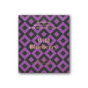A square wrapper for Goodio Organic Chocolate Wild Blueberry features a purple-black diamond pattern. Text: GOODIO, Stone Ground in Helsinki. Inspired by Finnish wild blueberries. 61% raw, organic, vegan chocolate. 48g (1.7oz).