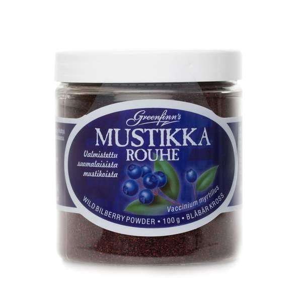 A clear plastic jar of Greenfinn's Wild Bilberry Powder with a white lid. The label shows blueberry images and bilingual text. The jar contains 100g of powder made from Finnish wild bilberries. Brand: Greenfinn's.