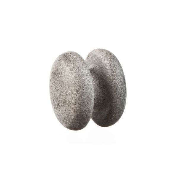 The Hukka Sauna-Joy Massage Aid by Hukka is a smooth, gray sauna stone featuring a center groove and dual-disk design, shown on a plain white background. Ideal for natural stone self-therapy sessions.