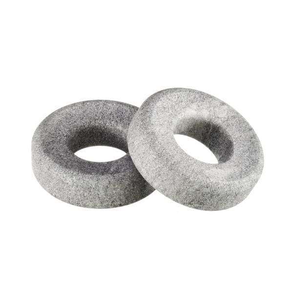 The Hukka Orbits Eye Stone by Hukka features two gray, round stone discs with smooth surfaces and large central holes, artistically overlapped to evoke the look of ancient eye stones.