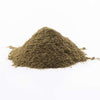 A small pile of Nordic Hempfarm Organic Hemp Powder, ideal for ketogenic diets, is scattered on a white surface.